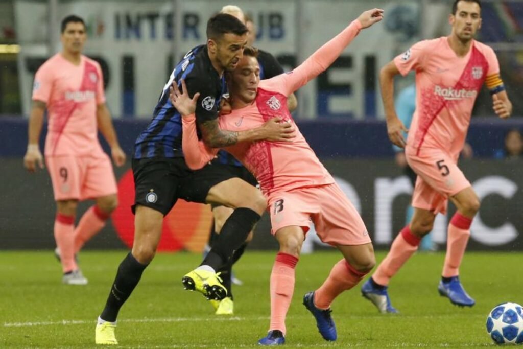 Inter edge past Atletico in tense Champions League clash