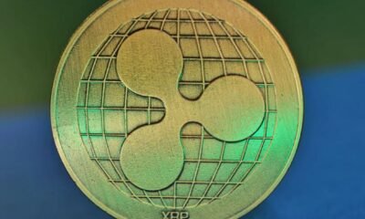 XRP Ripple logo cryptocurrency coin on dark background