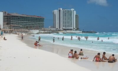 tourists walking in cancun resort area mexico