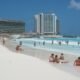 tourists walking in cancun resort area mexico