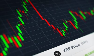 XRP Skyrockets 480% in a Year — But Is the Rally Built on Sand? 52 xrp cryptocurrency chart investor sitting computer 2025