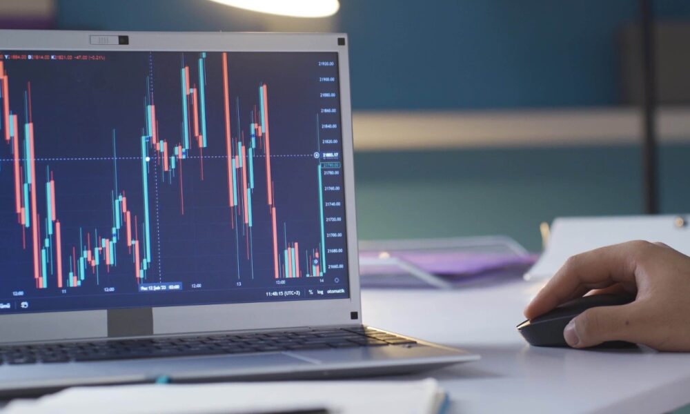 Investors analyzing stock charts